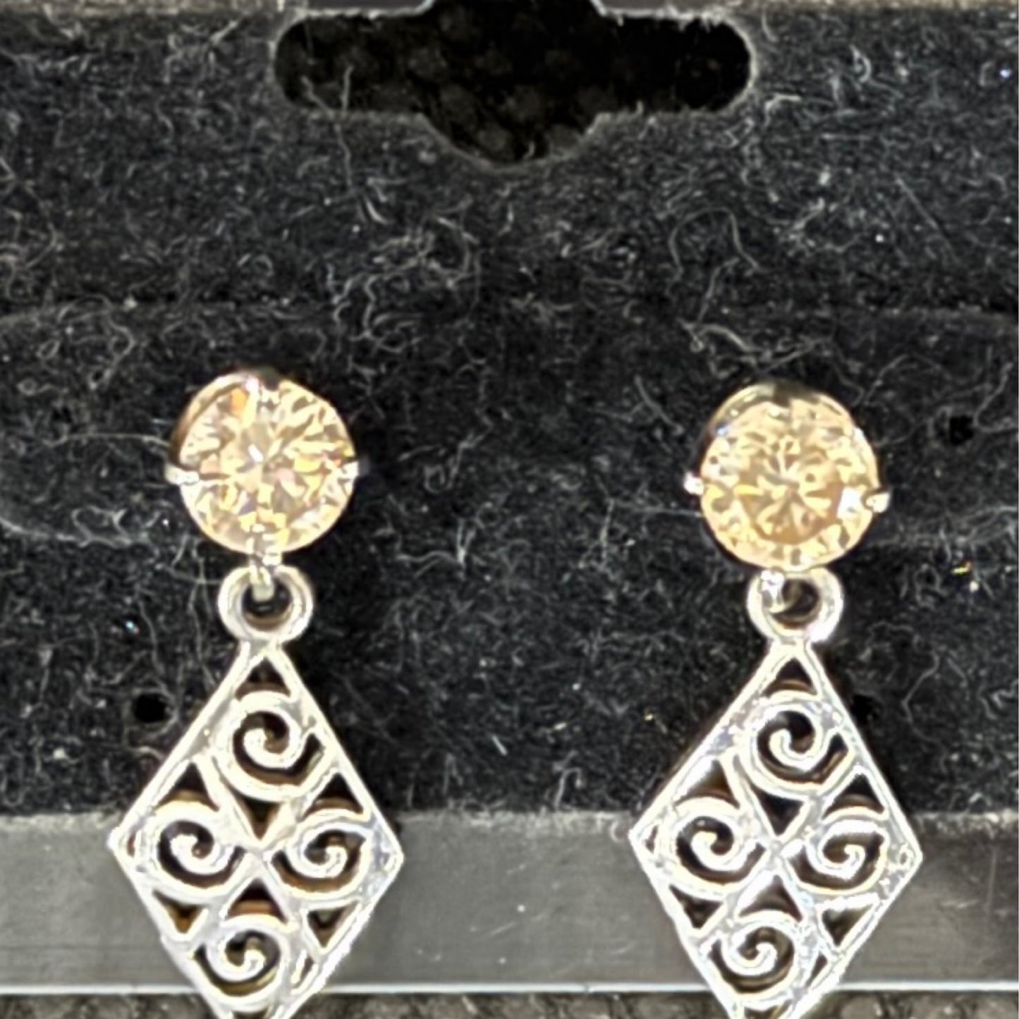 Earrings, champagne colored CZ with sterling dangle