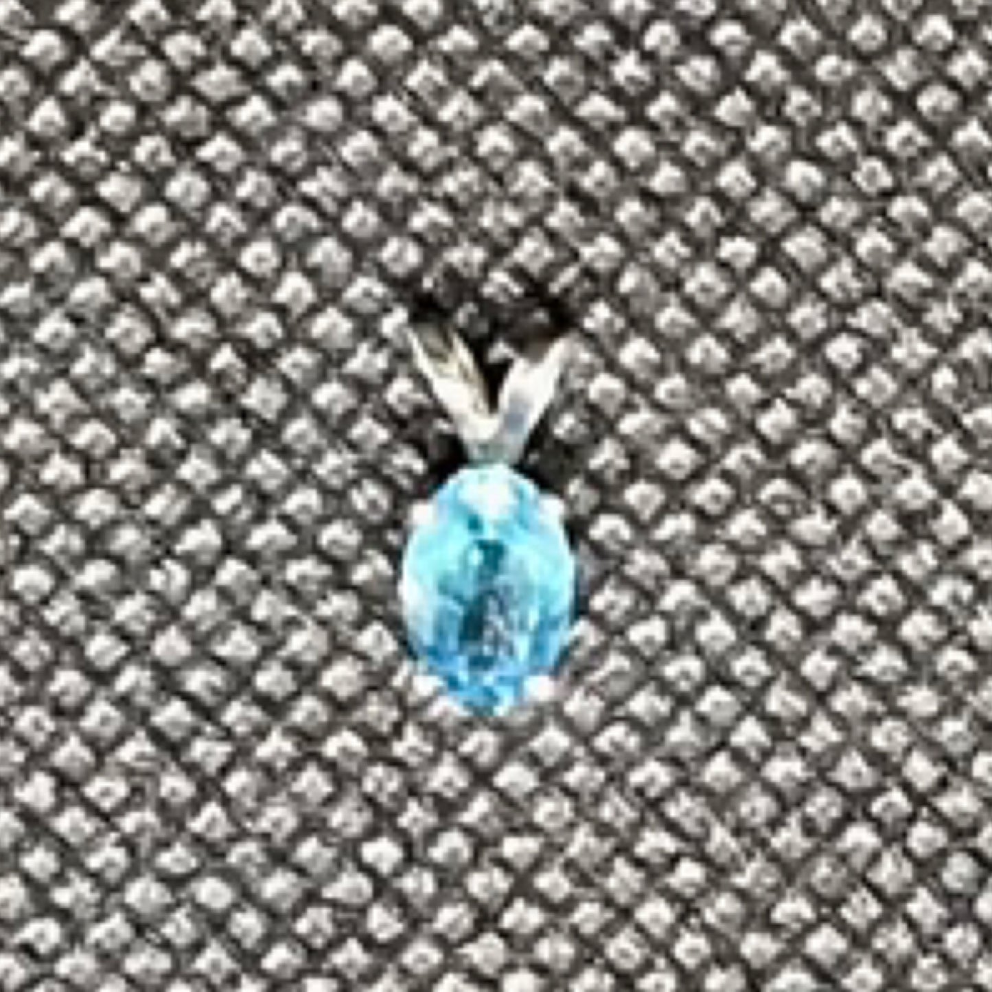 Pendant, Swiss Blue Topaz 7mm x 5 mm oval