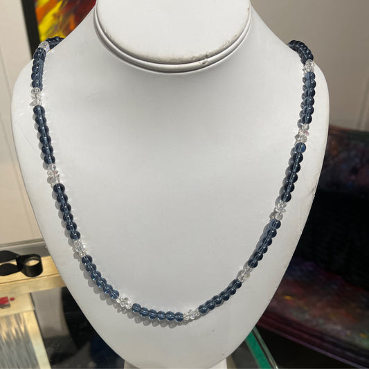 Necklace, blue and clear glass