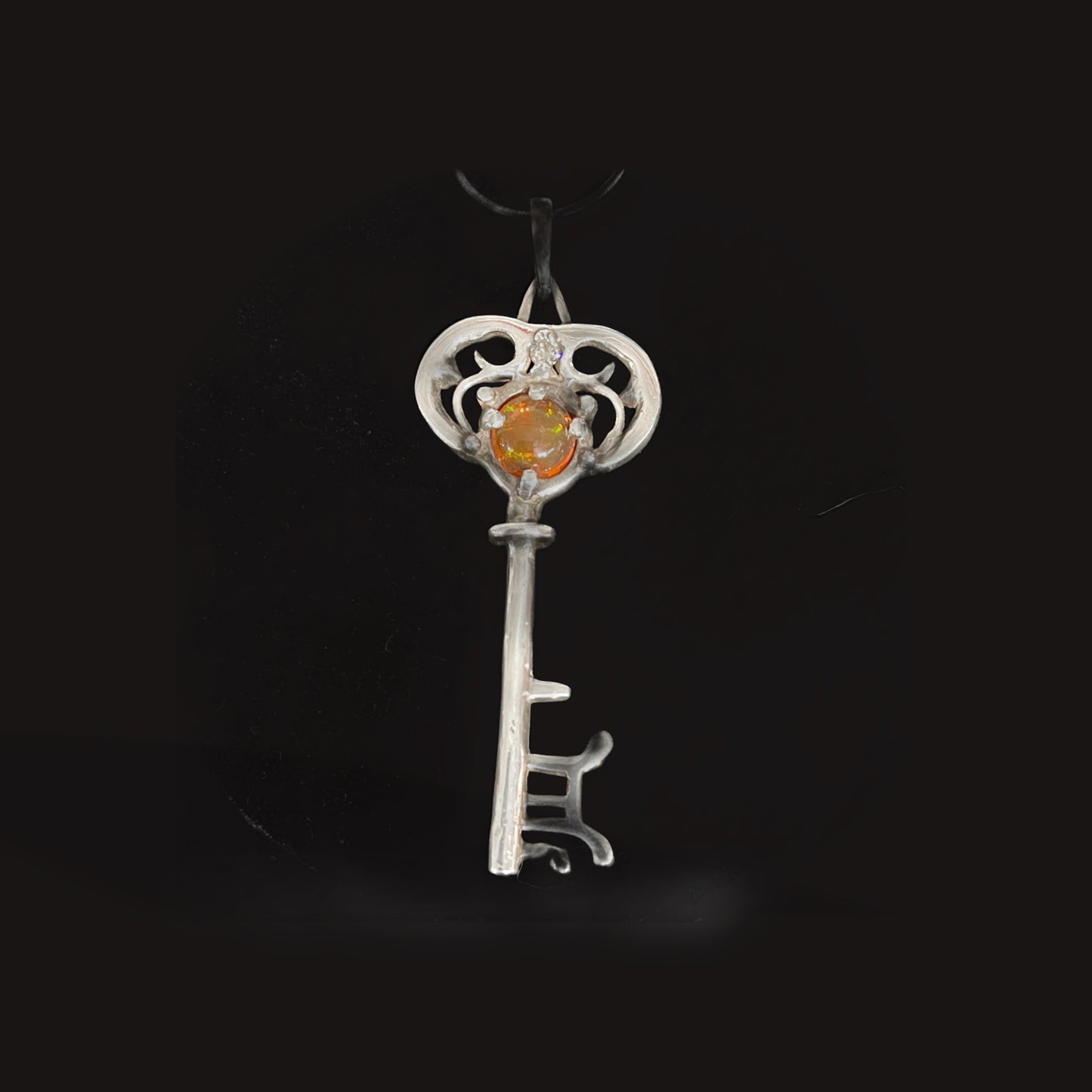 Key pendant, pure silver, with Opal, diamond, and Sapphire