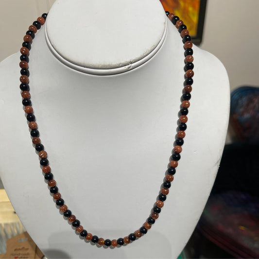 Necklace, gold stone and black obsidian