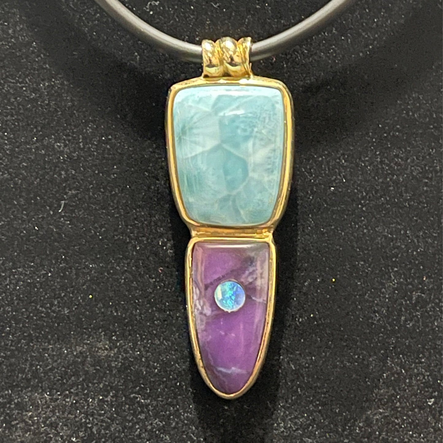Pendant, 14 karat yellow gold, Larimar, black opal and Sugilite